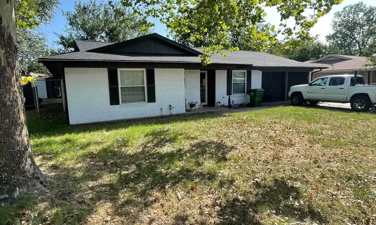 Professional roofing crew working on a residential roof in Lake Mary
